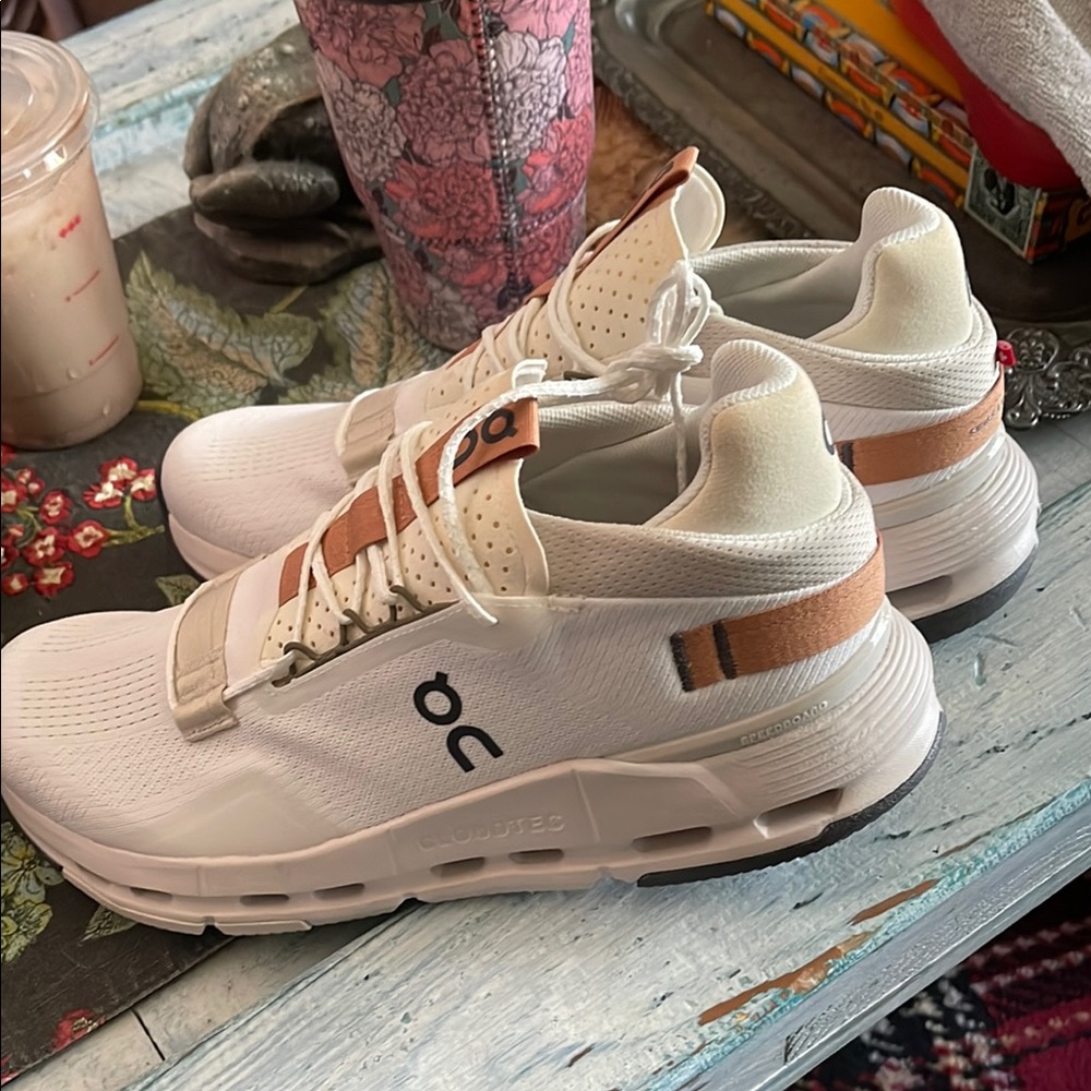 On Running Cream and Brown Sneakers